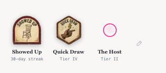 Three featured badges on a profile
